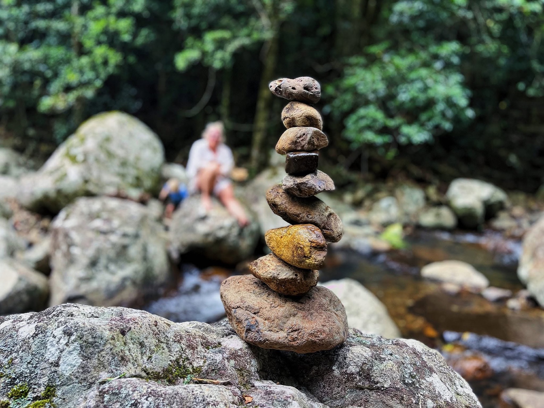 Stacked stones in an Australian coastal landscape